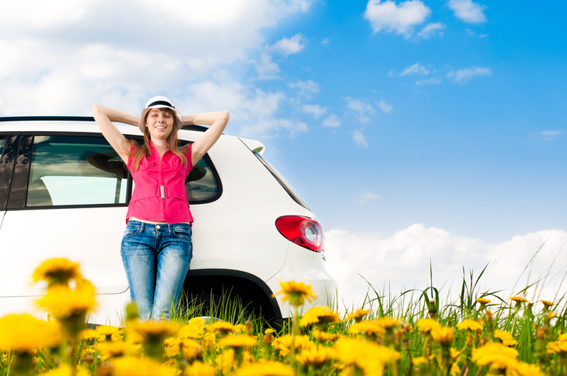 Woman & Car In Flowers